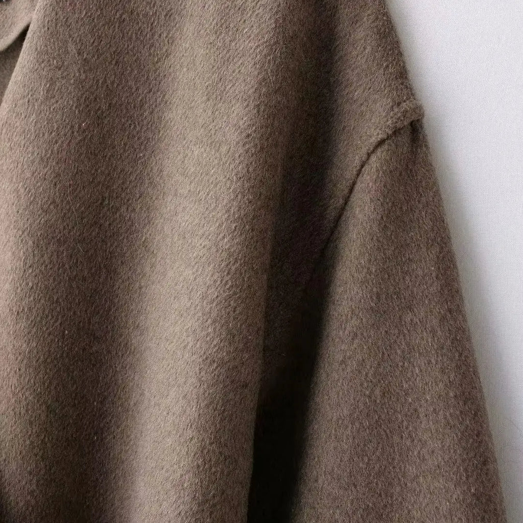 סוודר אלגנטי עם חגורה